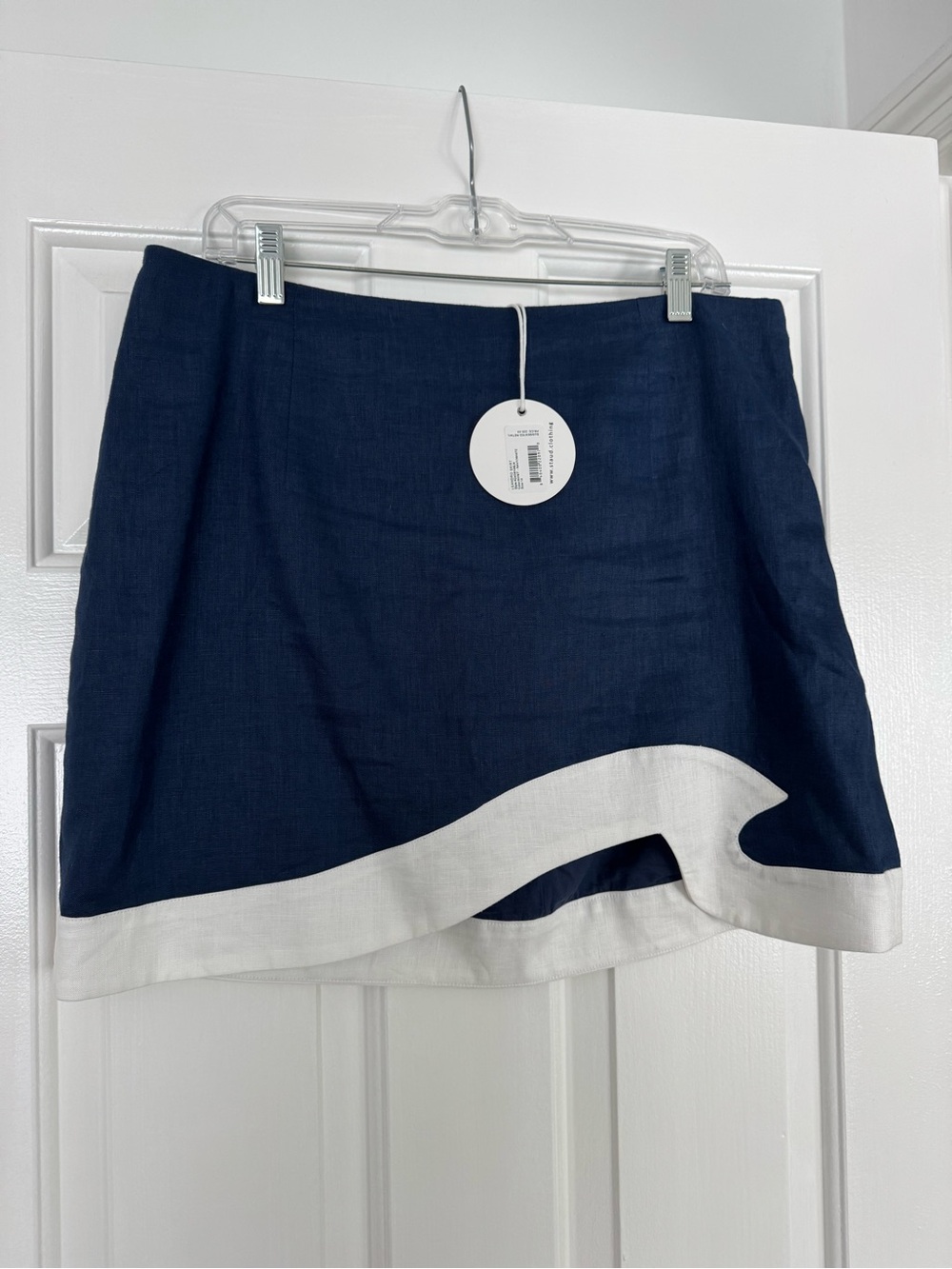 STAUD Navy Mini Skirt with White Wave Hem